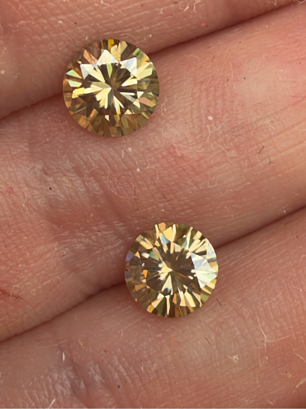Pair 2.34ctw pair VS champagne/brown loose moissanite in gem jar